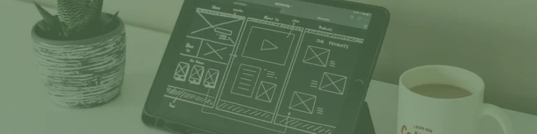 A tablet showcasing a Melbourne web design wireframe sits alongside a potted plant and a coffee mug on the white desk, evoking the vibe of enjoying smashed avo in a creative workspace.